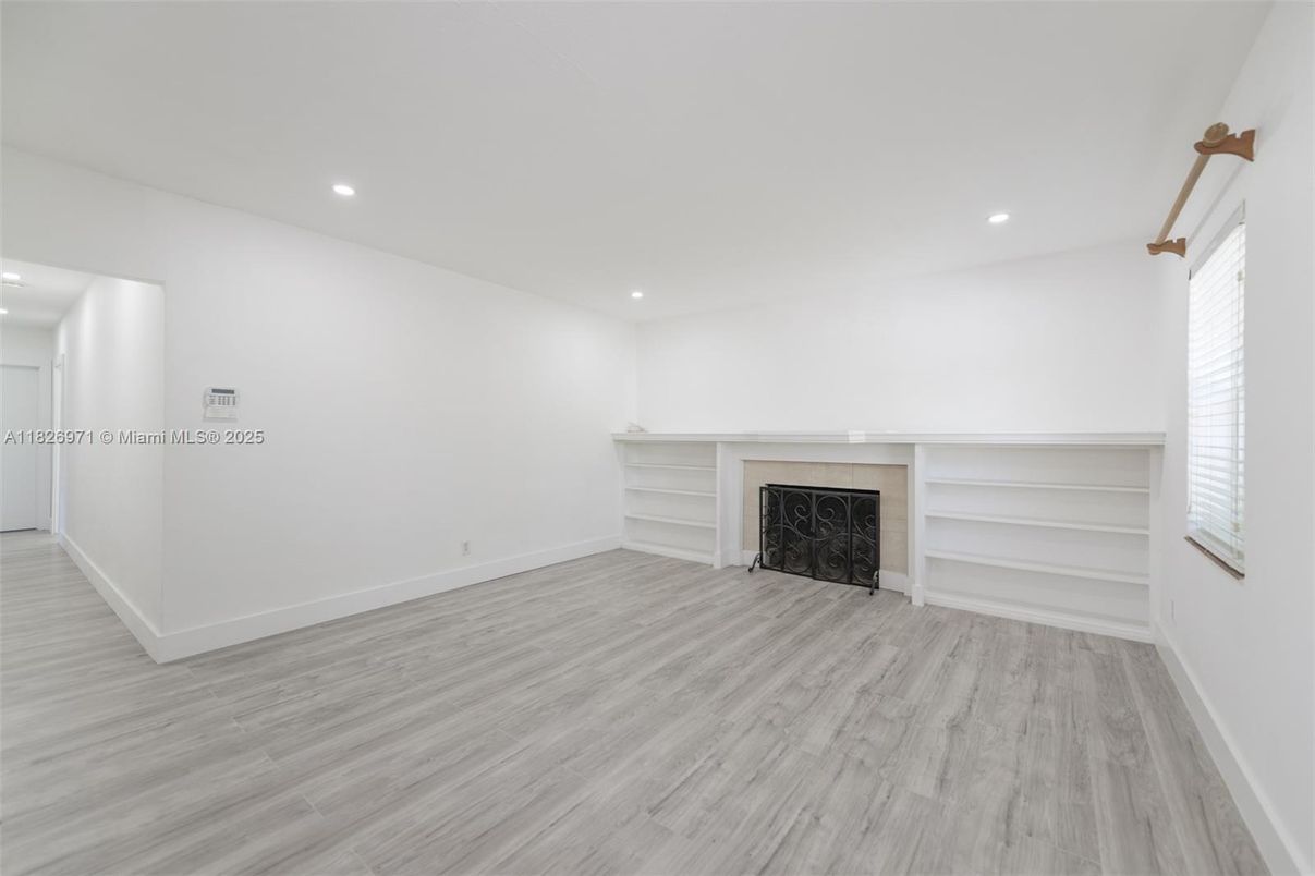 Empty room, Fireplace, Interior, Recessed Lighting, Wood Texture Flooring
