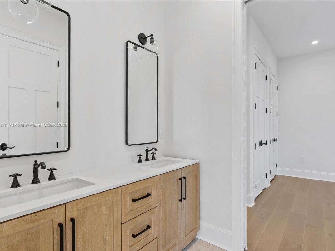 Bathroom, Dual Sink Vanities, Interior, Recessed Lighting, Wood Texture Flooring