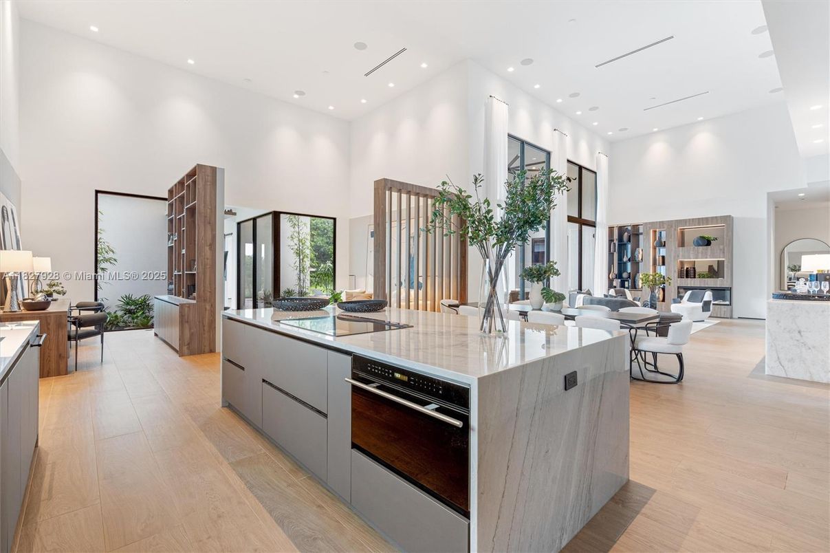 Dining room, Interior, Kitchen, Living room, Recessed Lighting, Stainless Steel Appliances, Wood Texture Flooring