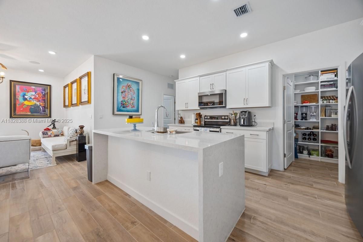 Interior, Kitchen, Living room, Recessed Lighting, Stainless Steel Appliances, Wood Texture Flooring