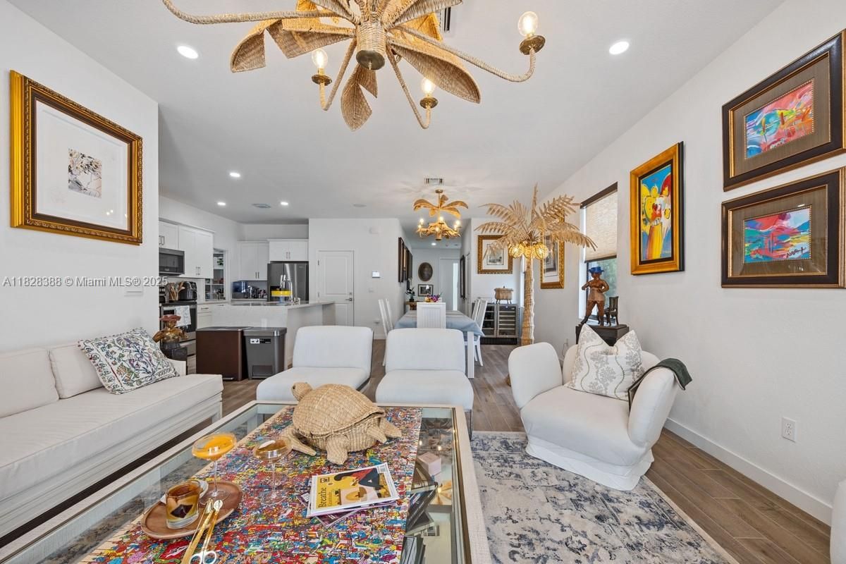 Chandelier, Dining room, Interior, Kitchen, Living room, Recessed Lighting, Stainless Steel Appliances, Wood Texture Flooring