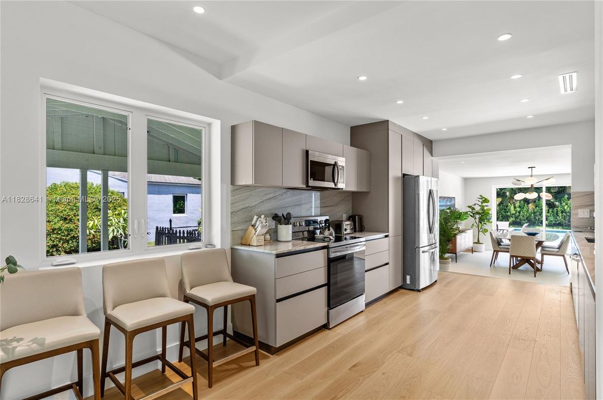 Dining room, Interior, Kitchen, Recessed Lighting, Stainless Steel Appliances, Wood Texture Flooring