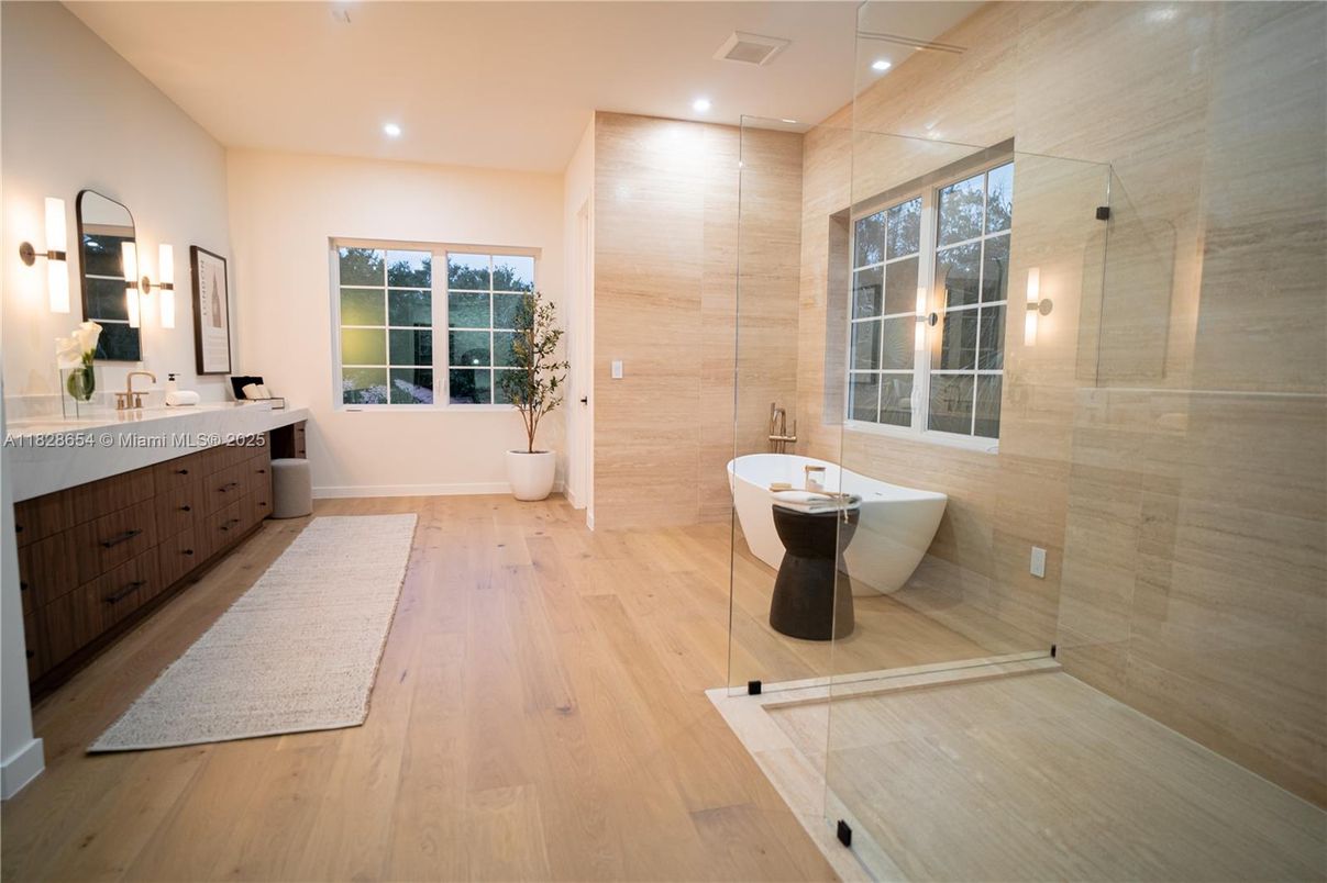 Bathroom, Free Standing Baths, Glass Shower, Interior, Recessed Lighting, Wood Texture Flooring