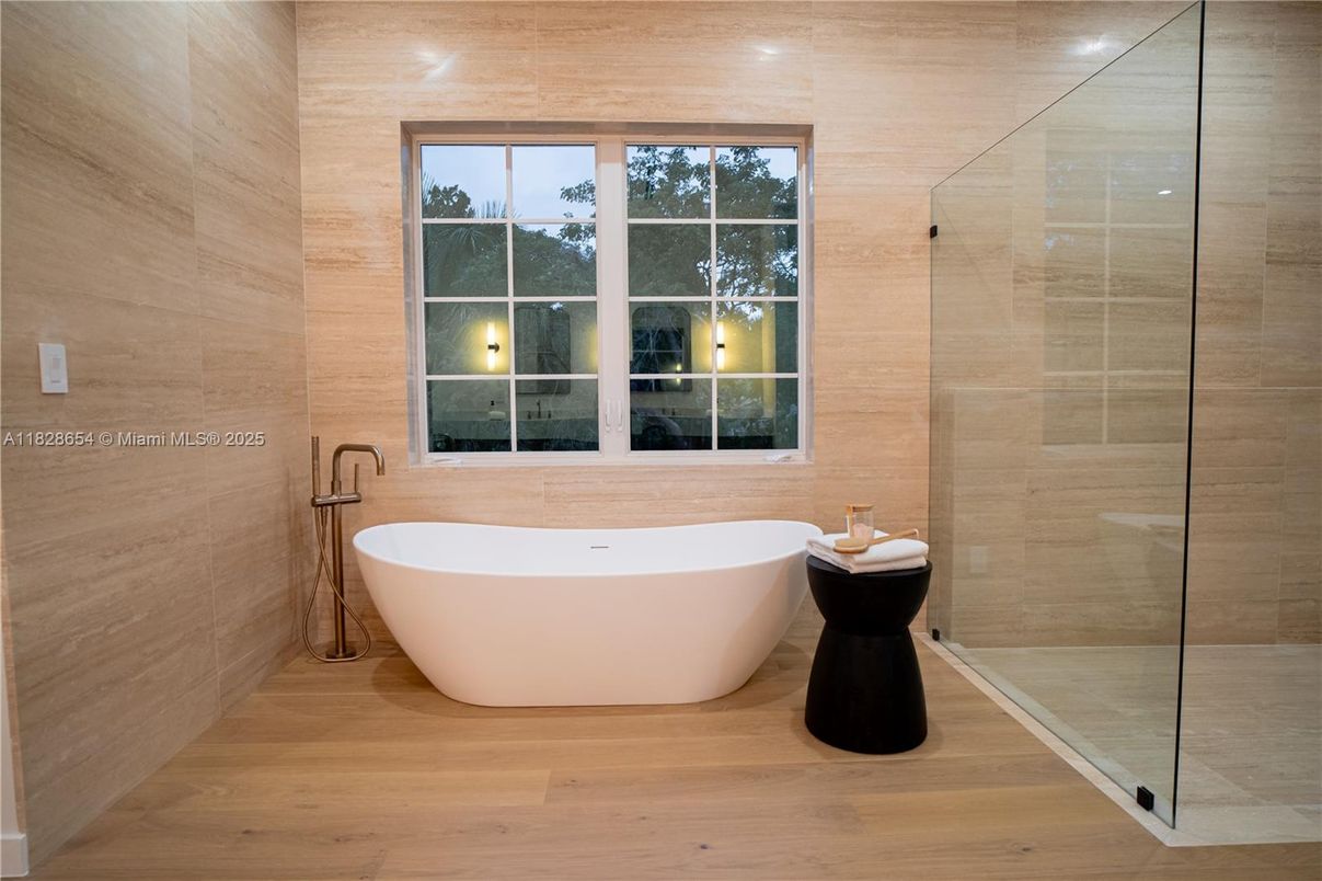 Bathroom, Free Standing Baths, Glass Shower, Interior, Recessed Lighting, Wood Texture Flooring