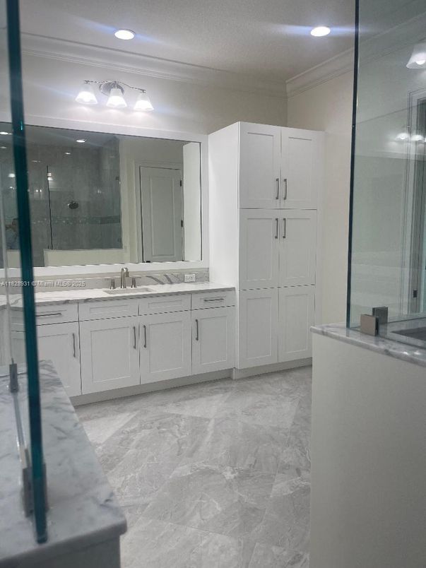Bathroom, Dual Sink Vanities, Glass Shower, Interior, Marble, Recessed Lighting
