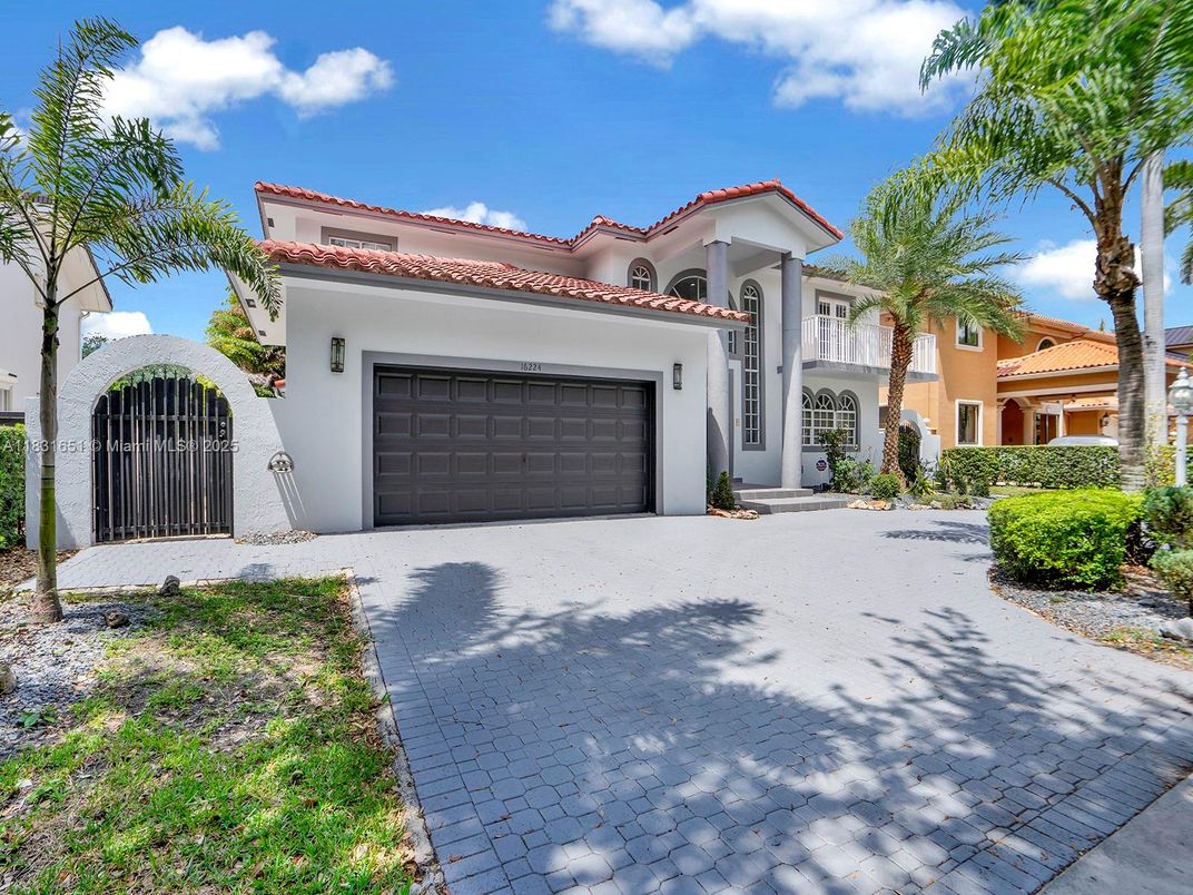 Attached, Exterior, Facade, Spanish Mediterranean