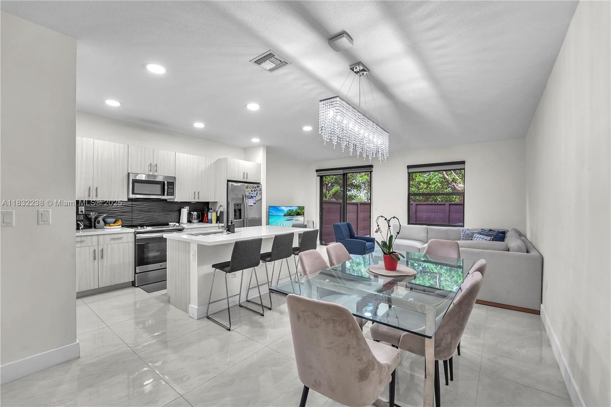 Chandelier, Dining room, Interior, Kitchen, Living room, Recessed Lighting, Stainless Steel Appliances