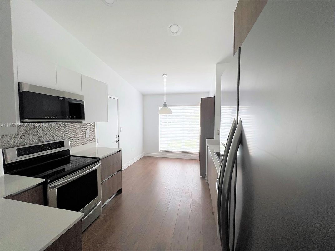 Interior, Kitchen, Pendant Lights, Stainless Steel Appliances, Wood Texture Flooring