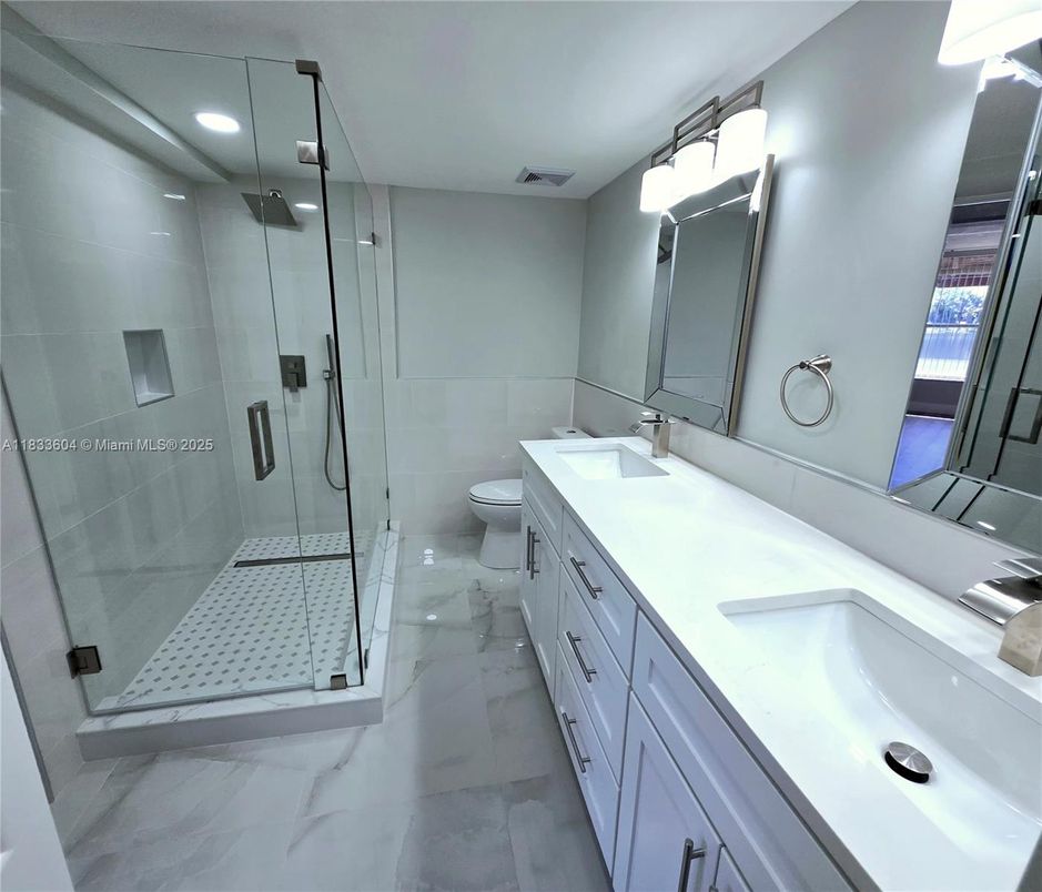 Bathroom, Dual Sink Vanities, Glass Shower, Interior, Marble, Recessed Lighting