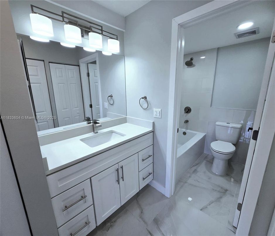 Bathroom, Dual Sink Vanities, Interior, Marble, Recessed Lighting