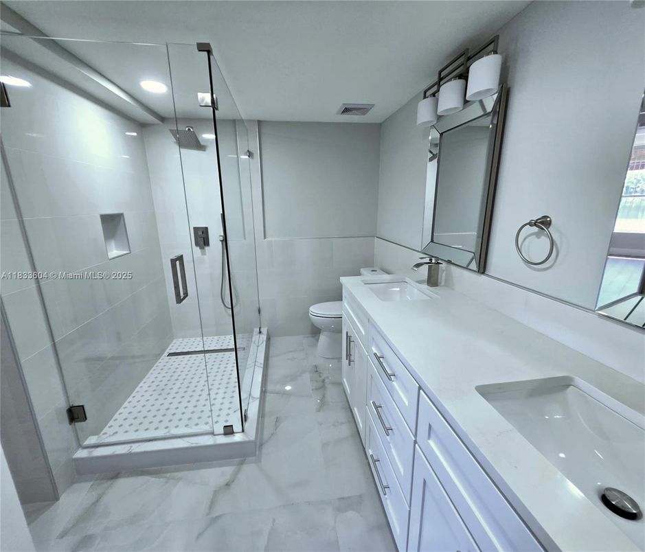 Bathroom, Dual Sink Vanities, Glass Shower, Interior, Marble, Recessed Lighting