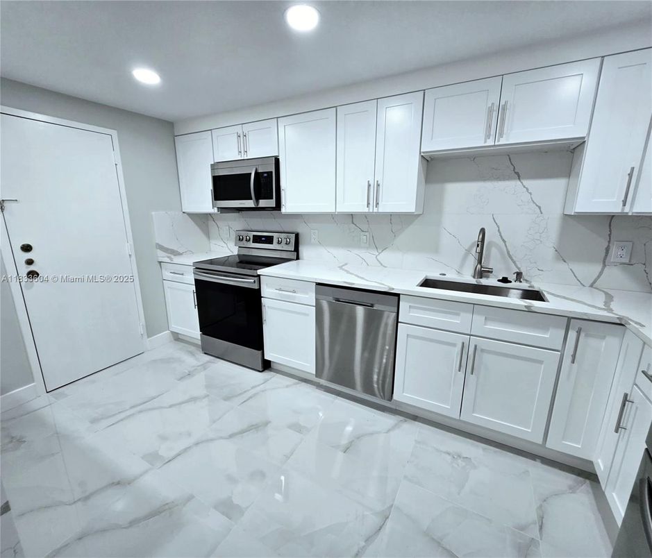 Interior, Kitchen, Marble, Marble Walls, Recessed Lighting, Stainless Steel Appliances