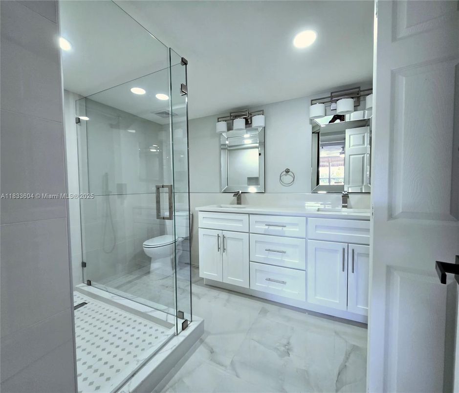 Bathroom, Dual Sink Vanities, Glass Shower, Interior, Marble, Recessed Lighting