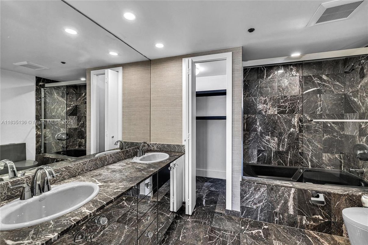 Bathroom, Dual Sink Vanities, Glass Shower, Interior, Marble, Marble Walls, Recessed Lighting