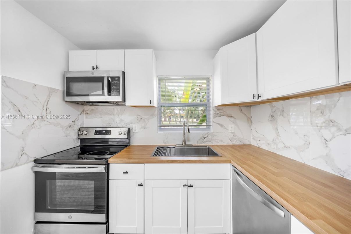 Interior, Kitchen, Marble Walls, Stainless Steel Appliances