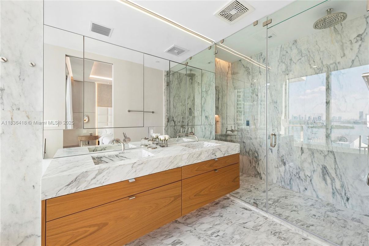 Bathroom, Dual Sink Vanities, Glass Shower, Interior, Marble, Marble Walls, Recessed Lighting