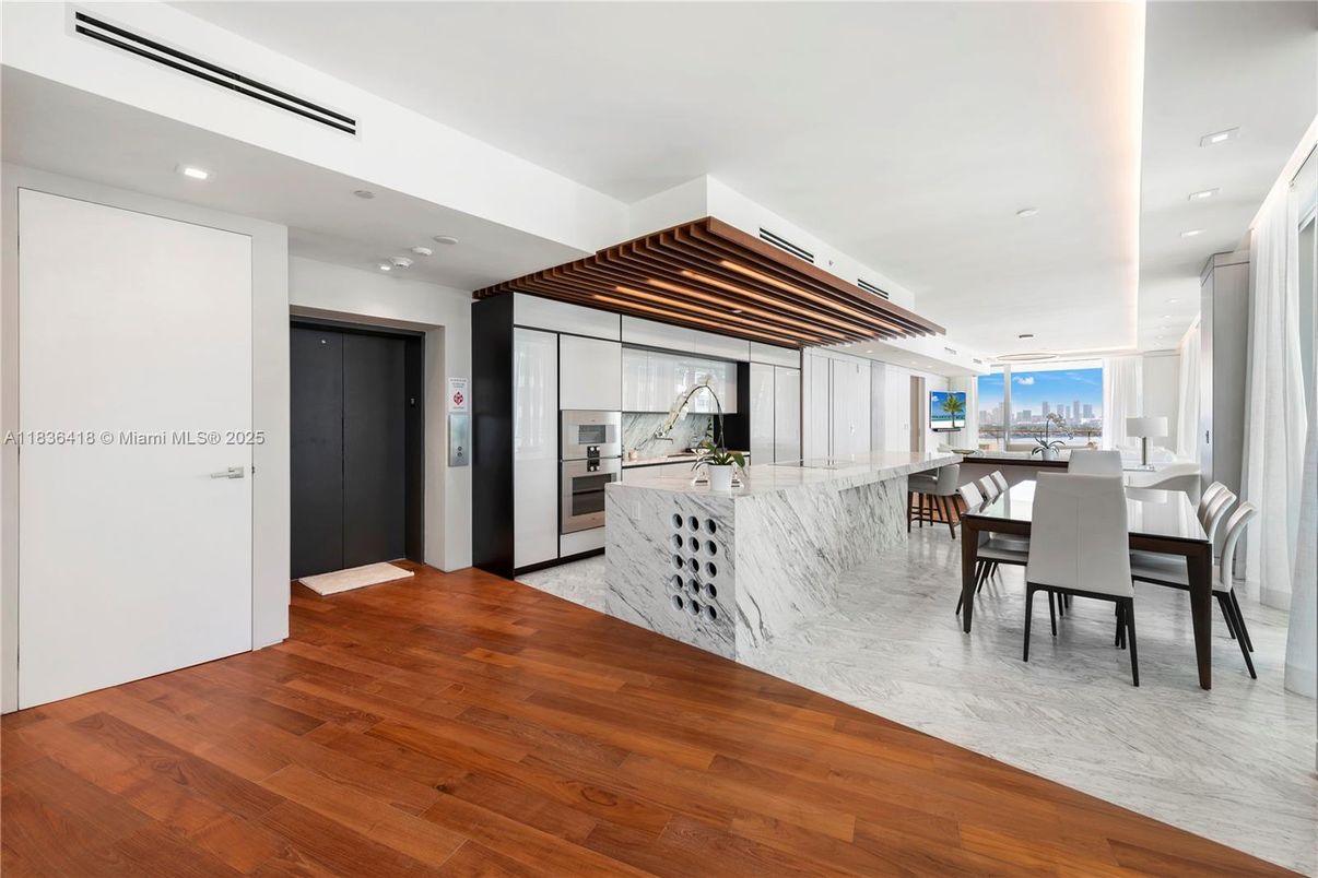 Dining room, Interior, Kitchen, Recessed Lighting, Stainless Steel Appliances, Wood Texture Flooring