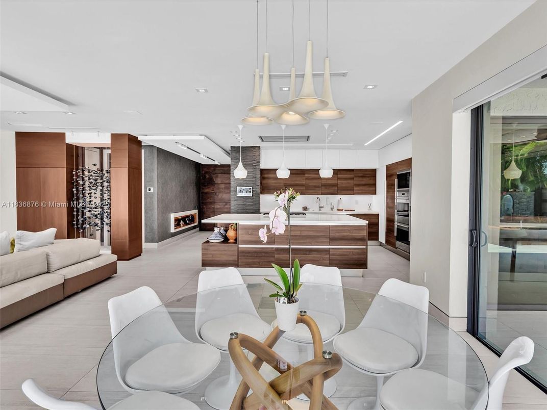 Dining room, Fireplace, Interior, Kitchen, Living room, Pendant Lights, Recessed Lighting, Stainless Steel Appliances, Stone Walls