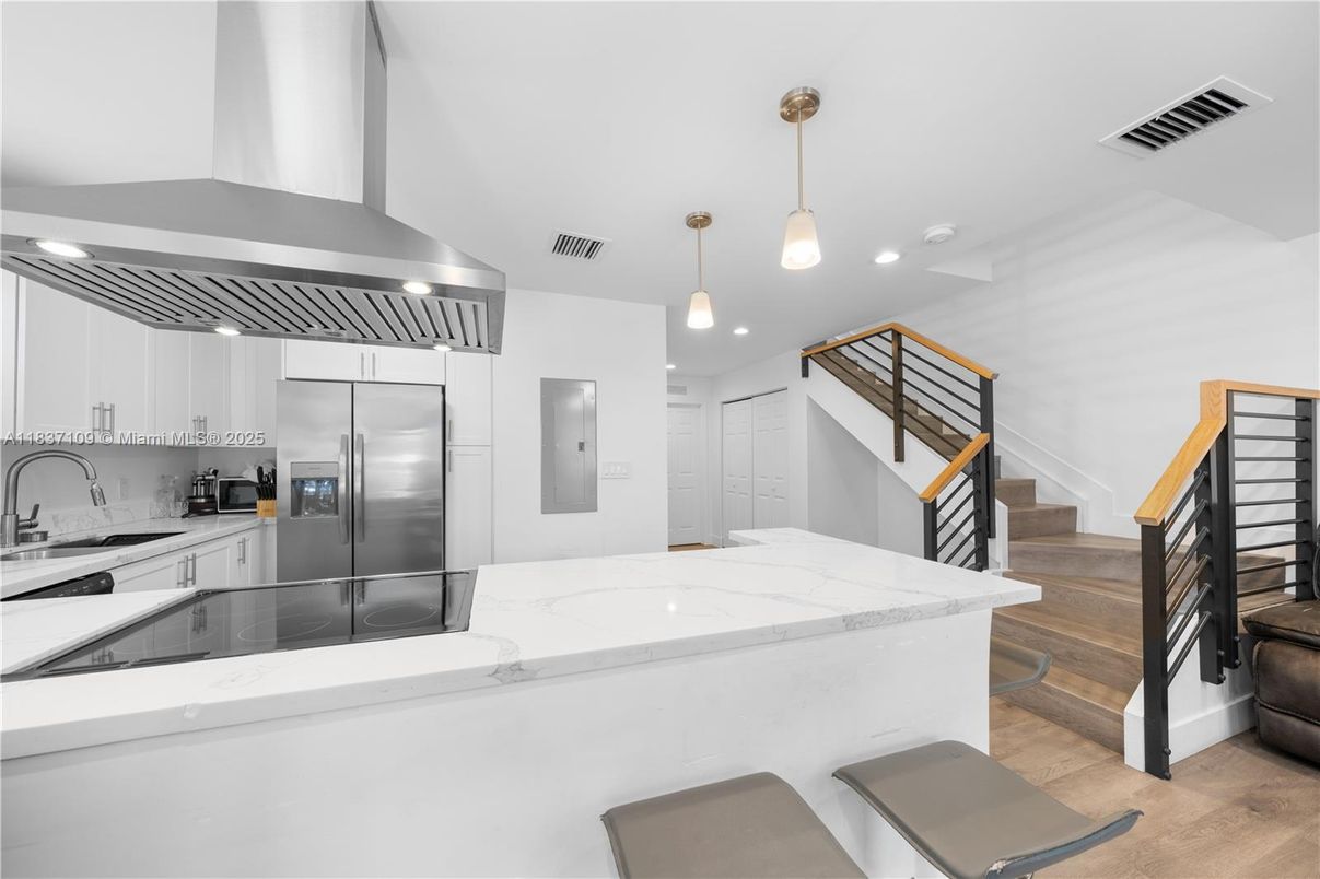 Interior, Kitchen, Pendant Lights, Recessed Lighting, Stainless Steel Appliances, Wood Texture Flooring