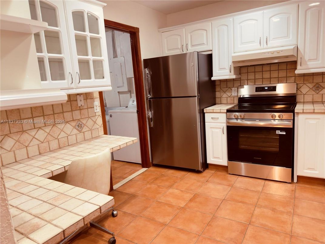 Interior, Kitchen, Stainless Steel Appliances, Tile Countertops