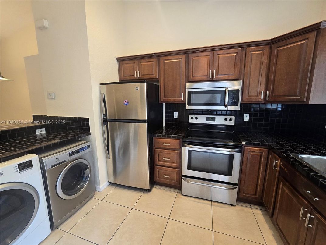 Interior, Kitchen, Tile Countertops, Washer