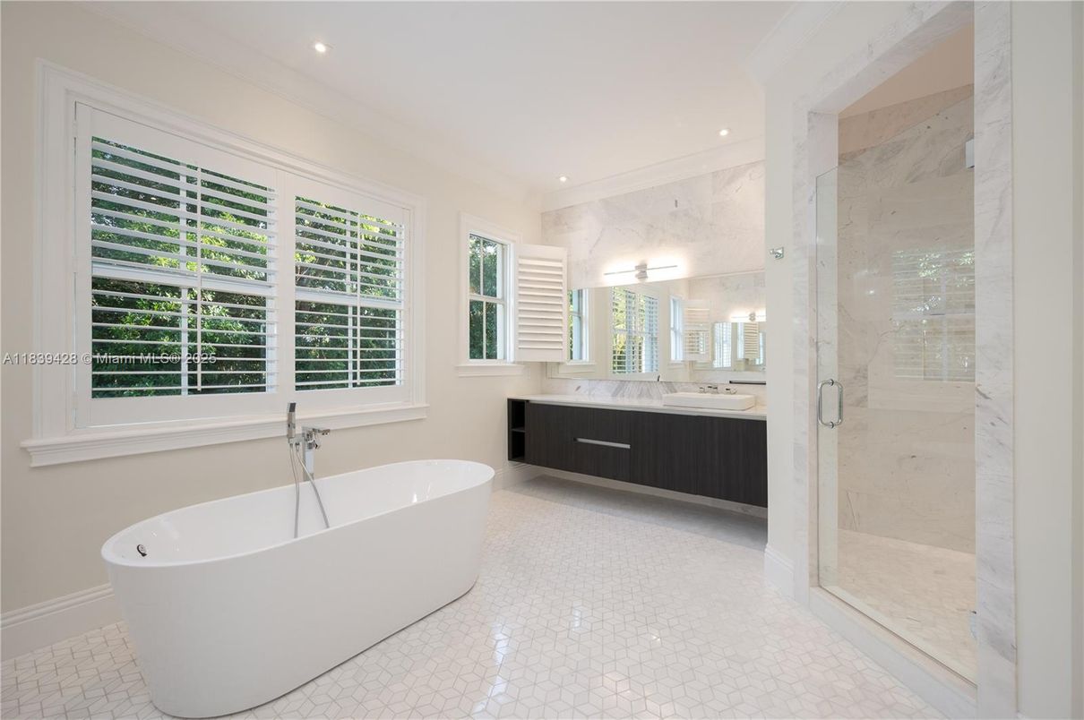 Bathroom, Dual Sink Vanities, Free Standing Baths, Glass Shower, Interior, Marble Walls, Recessed Lighting