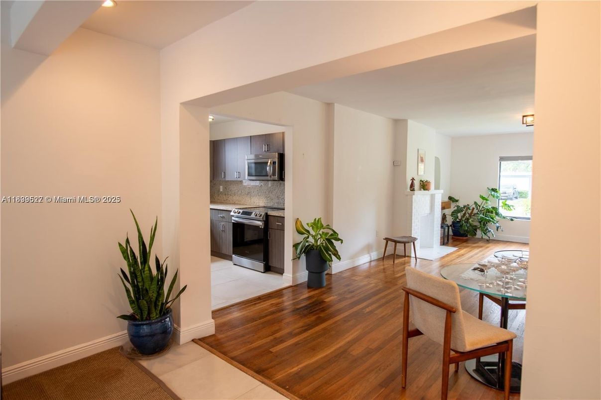 Dining room, Interior, Kitchen, Recessed Lighting, Stainless Steel Appliances, Wood Texture Flooring