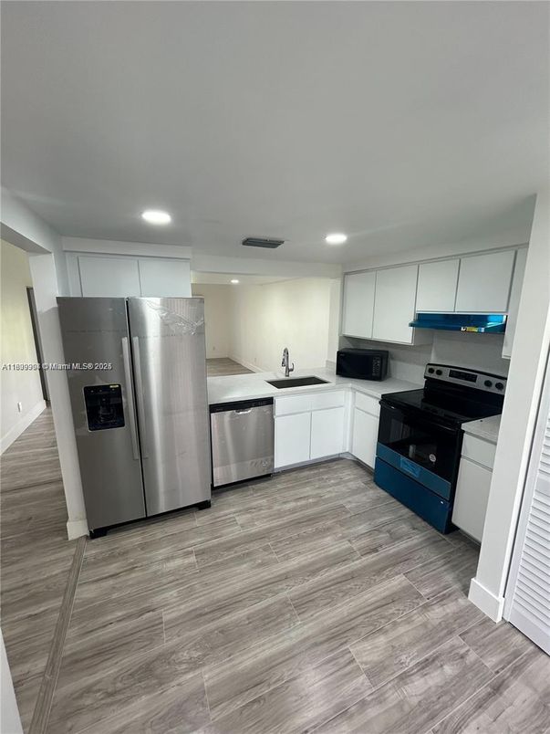 Interior, Kitchen, Recessed Lighting, Stainless Steel Appliances, Wood Texture Flooring