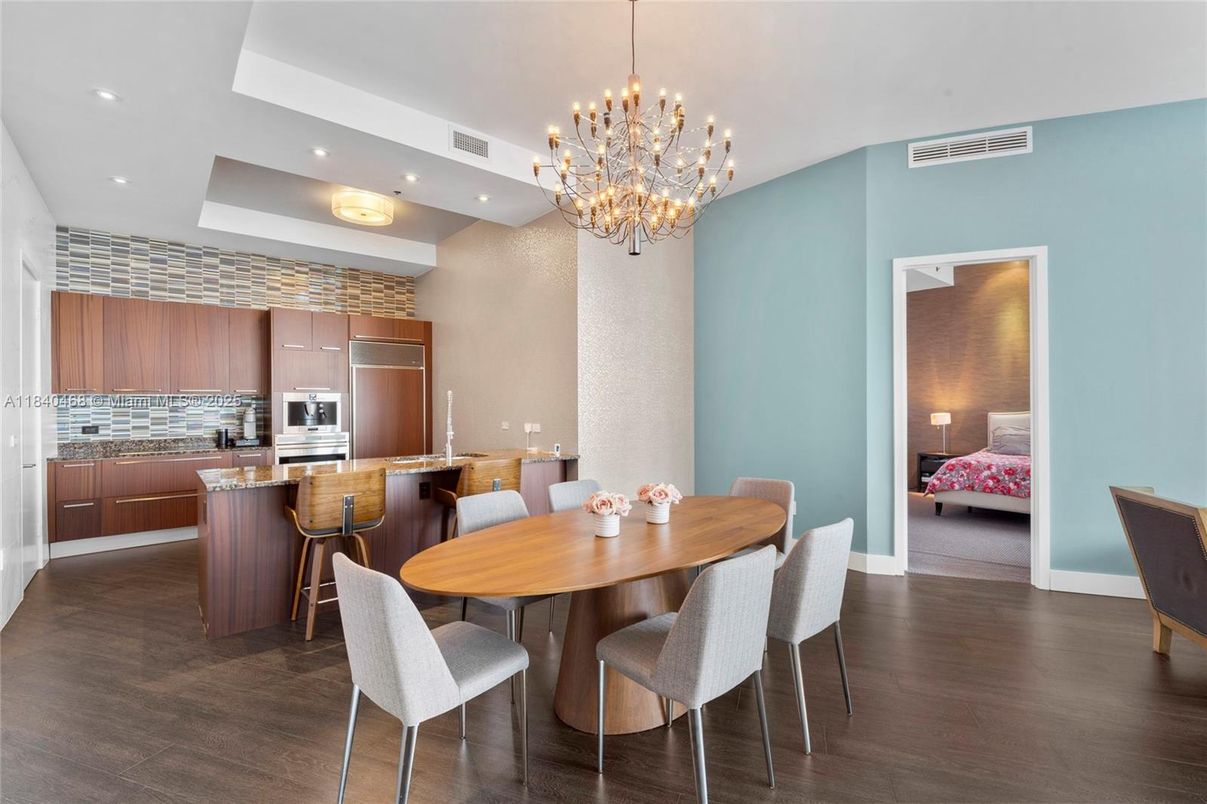 Bedroom, Chandelier, Dining room, Interior, Kitchen, Recessed Lighting, Stainless Steel Appliances, Wood Texture Flooring