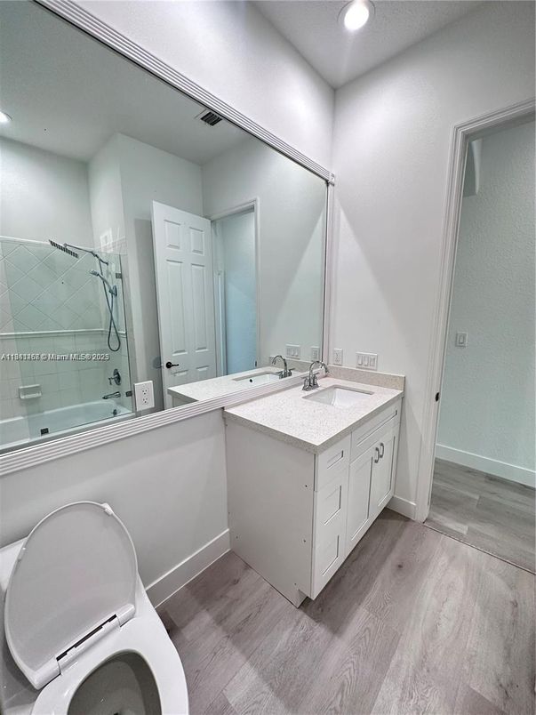 Bathroom, Dual Sink Vanities, Interior, Recessed Lighting, Wood Texture Flooring