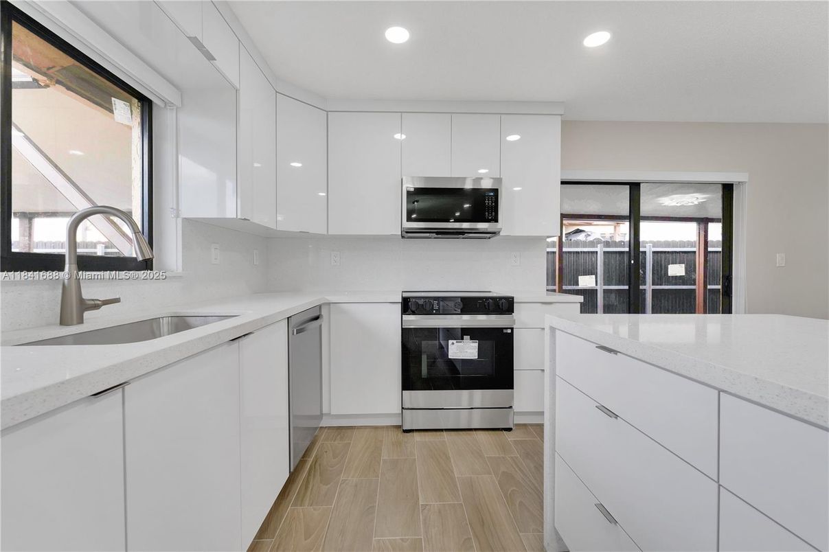 Interior, Kitchen, Recessed Lighting, Stainless Steel Appliances, Wood Texture Flooring