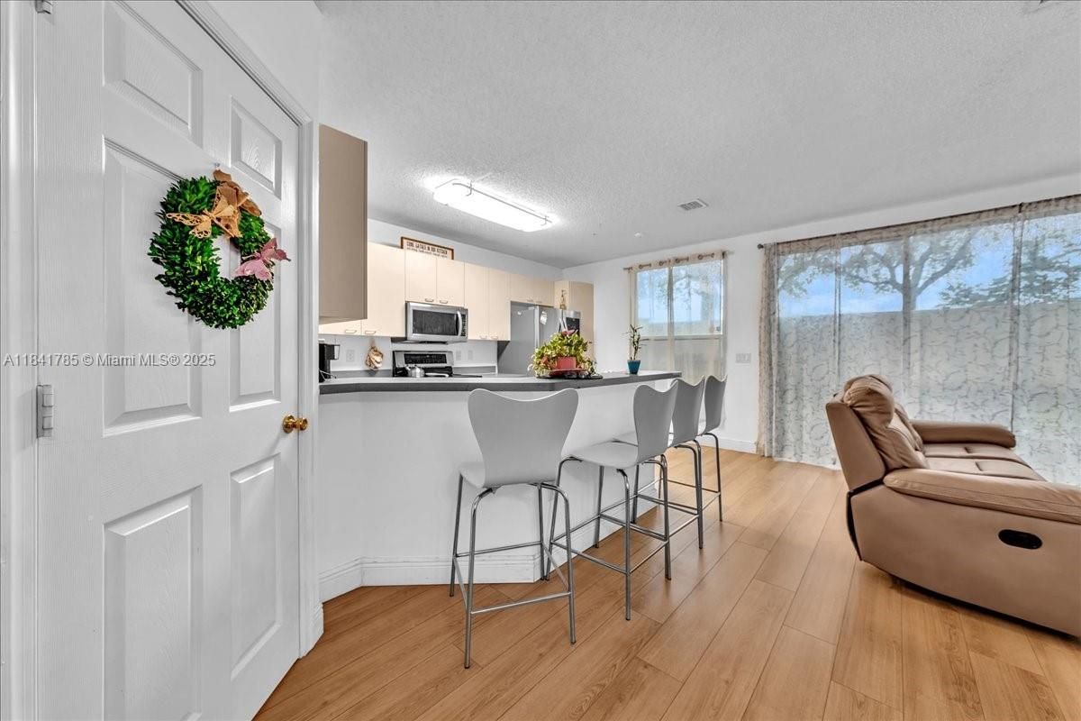 Interior, Kitchen, Living room, Recessed Lighting, Stainless Steel Appliances, Wood Texture Flooring