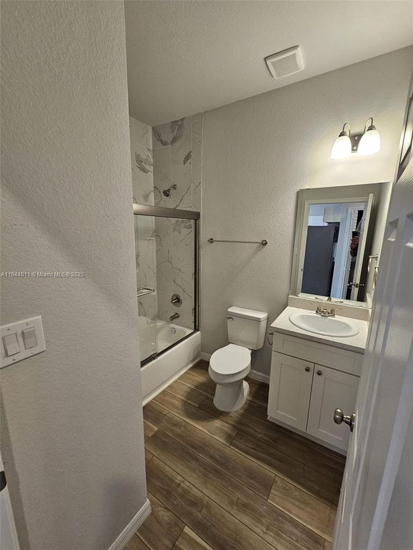 Bathroom, Glass Shower, Interior, Marble Walls, Wood Texture Flooring