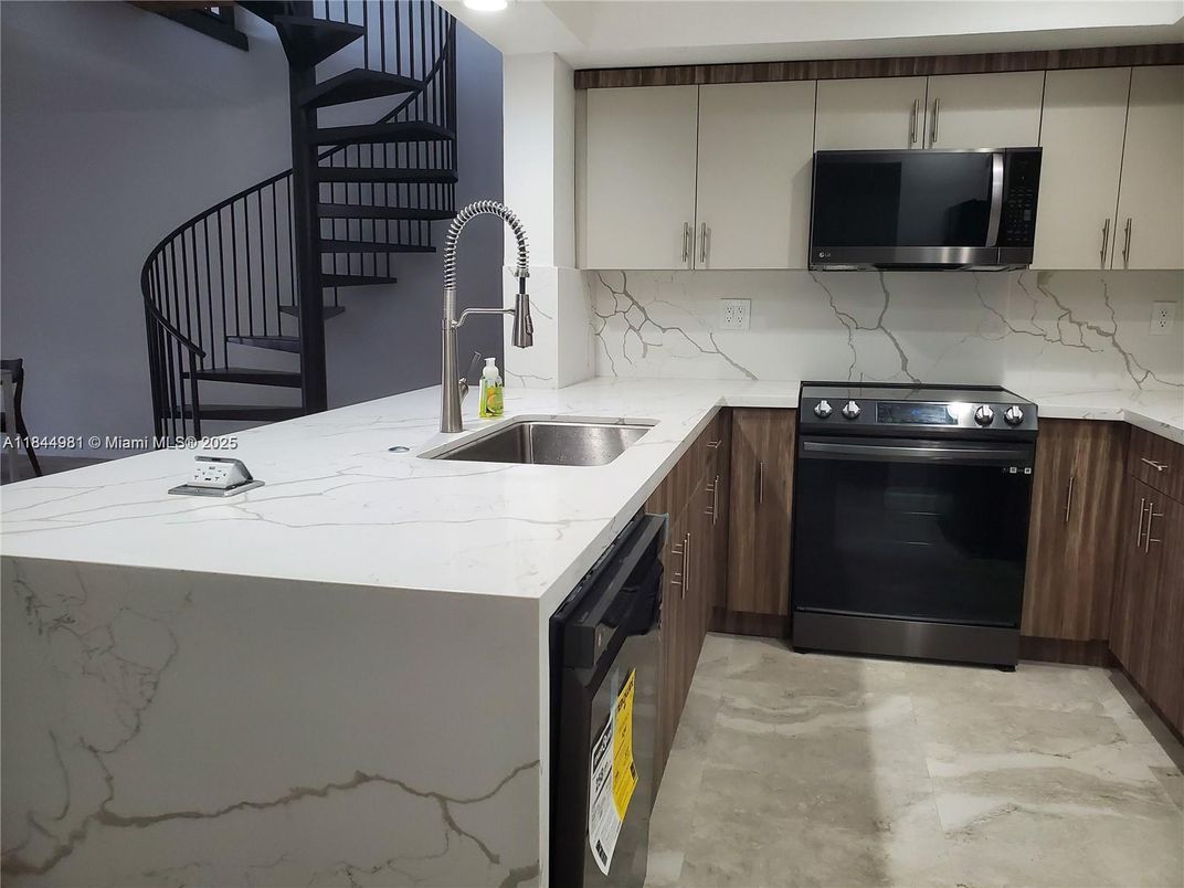 Interior, Kitchen, Marble Walls, Stainless Steel Appliances