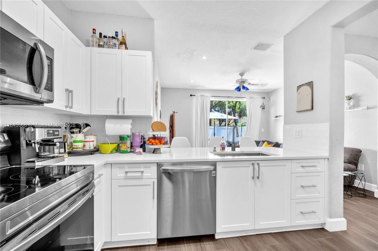 Interior, Kitchen, Recessed Lighting, Stainless Steel Appliances, Wood Texture Flooring