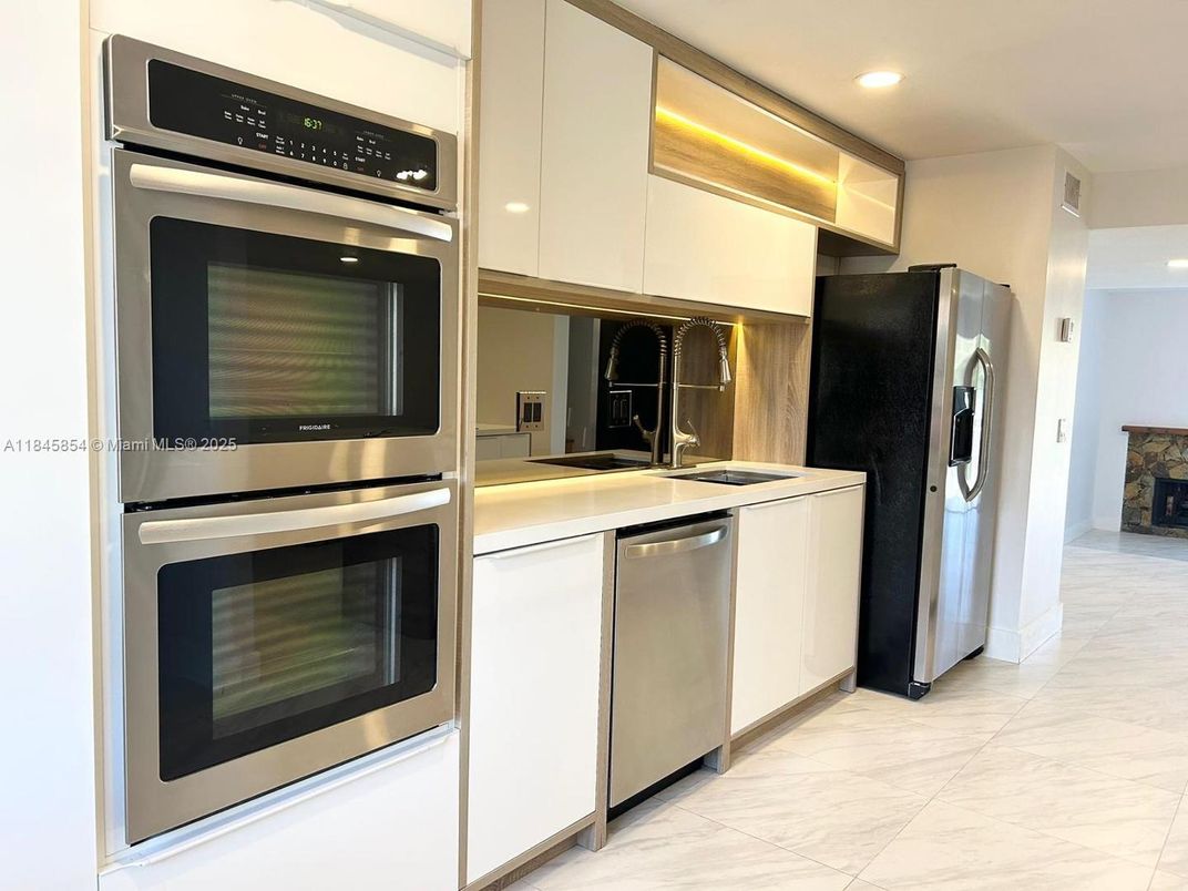 Fireplace, Interior, Kitchen, Marble, Recessed Lighting, Stainless Steel Appliances