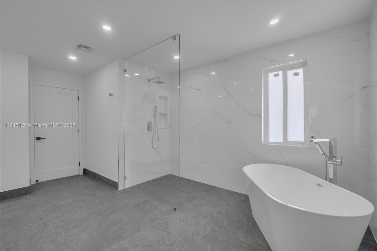 Bathroom, Free Standing Baths, Glass Shower, Interior, Marble Walls, Recessed Lighting