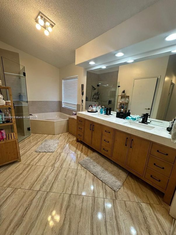 Bathroom, Dual Sink Vanities, Glass Shower, Interior, Recessed Lighting, Wood Texture Flooring