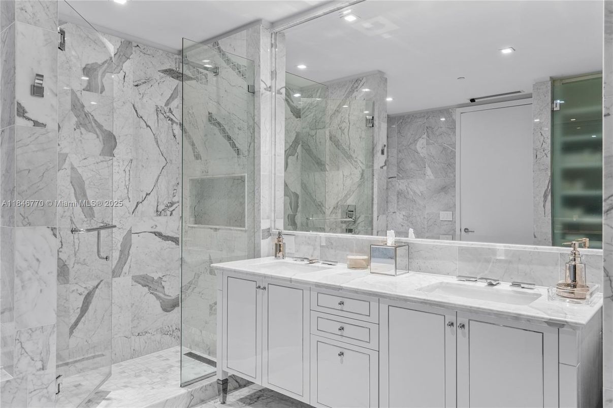 Bathroom, Dual Sink Vanities, Glass Shower, Interior, Marble, Marble Walls, Recessed Lighting
