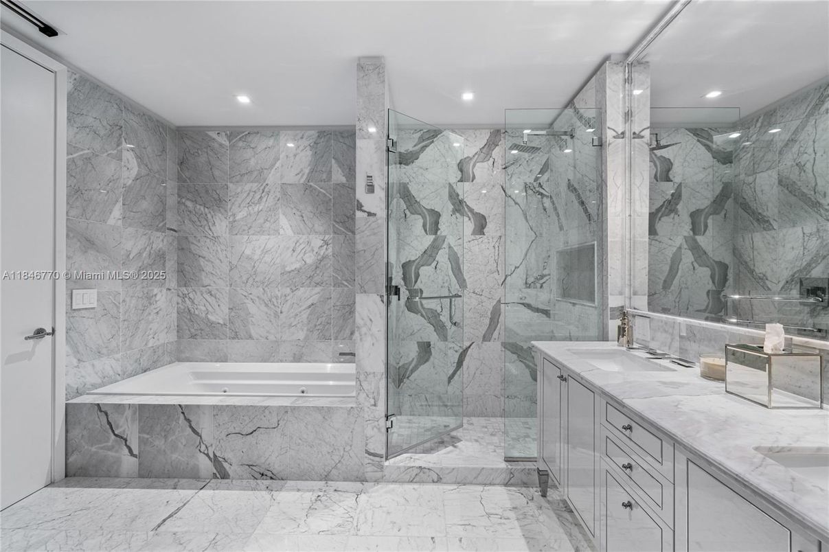 Bathroom, Dual Sink Vanities, Glass Shower, Interior, Marble, Marble Walls, Recessed Lighting