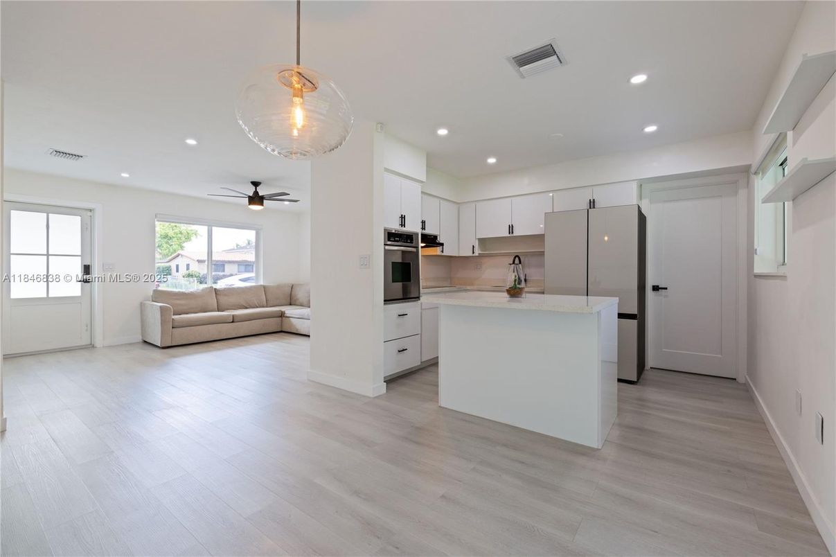 Interior, Kitchen, Pendant Lights, Recessed Lighting, Stainless Steel Appliances, Wood Texture Flooring