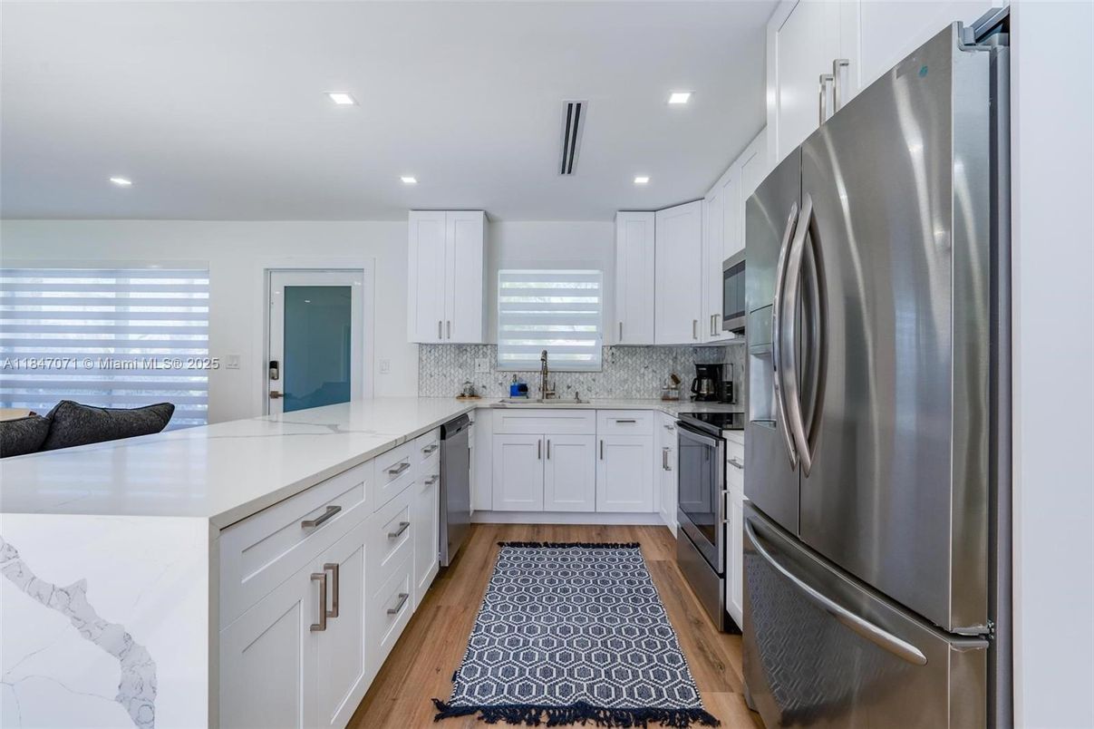 Interior, Kitchen, Recessed Lighting, Stainless Steel Appliances, Wood Texture Flooring