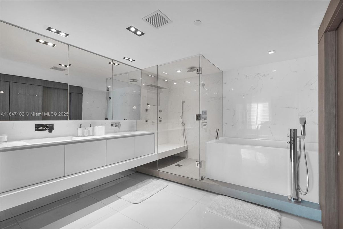 Bathroom, Dual Sink Vanities, Glass Shower, Interior, Marble Walls, Recessed Lighting
