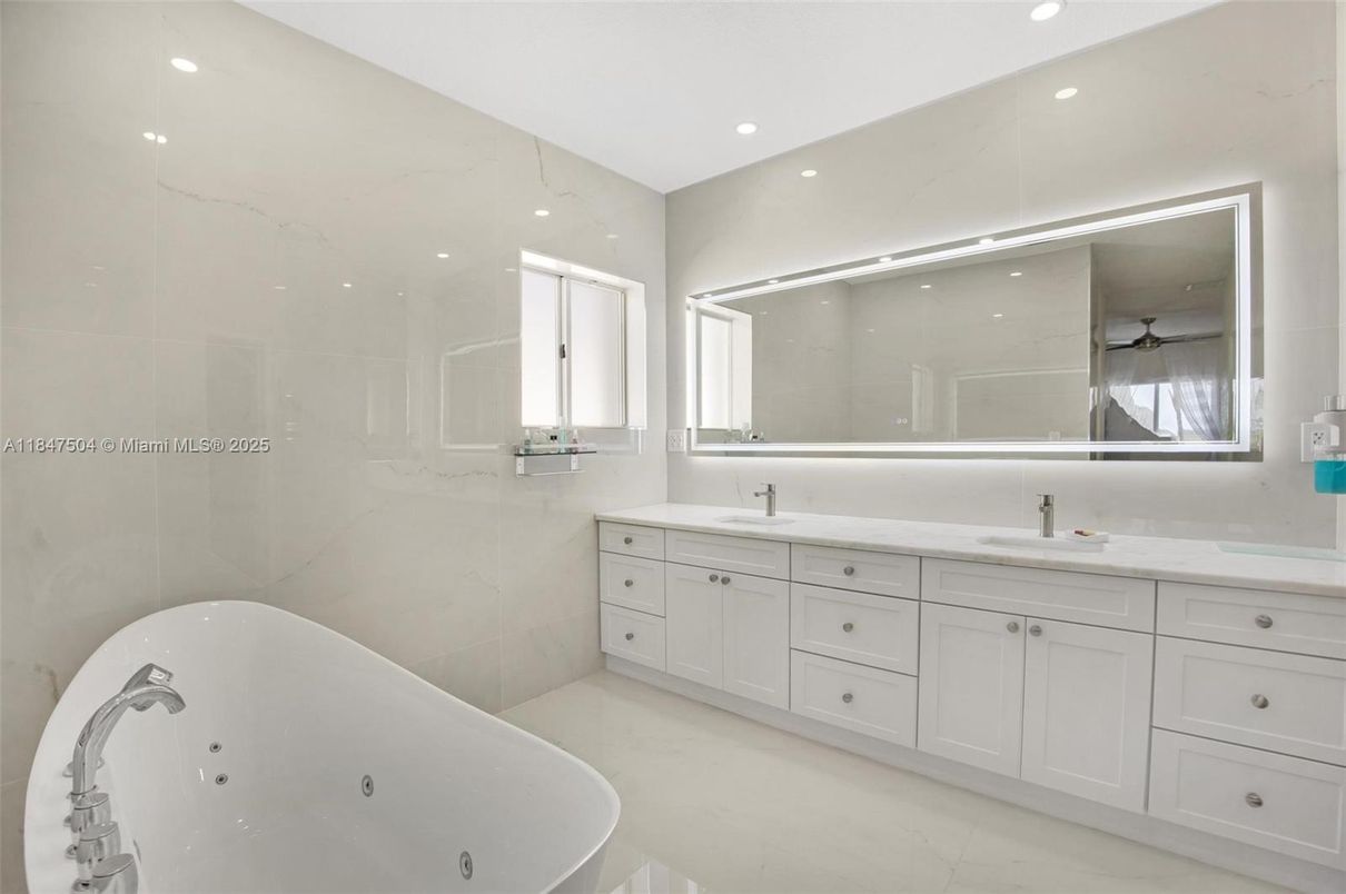 Bathroom, Dual Sink Vanities, Free Standing Baths, Interior, Marble Walls, Recessed Lighting