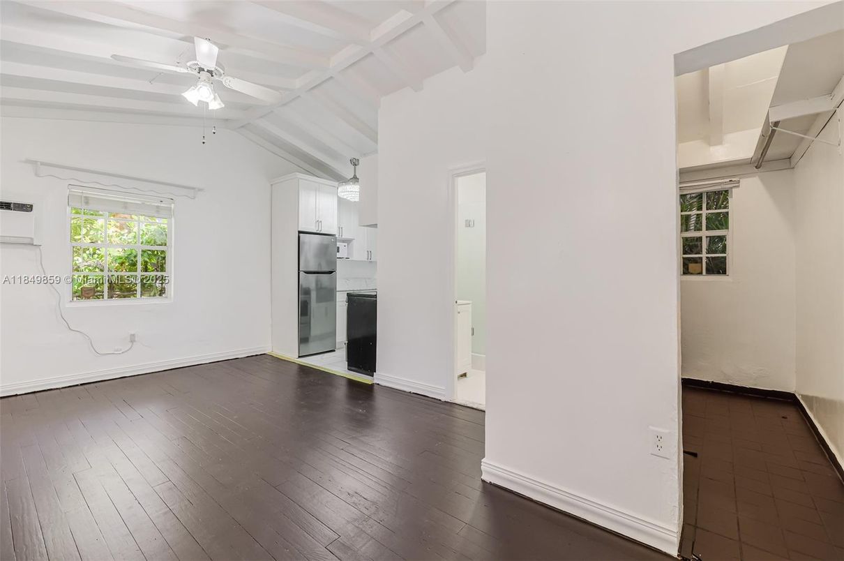 Empty room, Interior, Kitchen, Pendant Lights, Stainless Steel Appliances, Wood Texture Flooring
