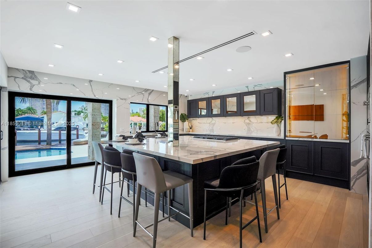 Interior, Kitchen, Marble Walls, Recessed Lighting, Water, Wood Texture Flooring