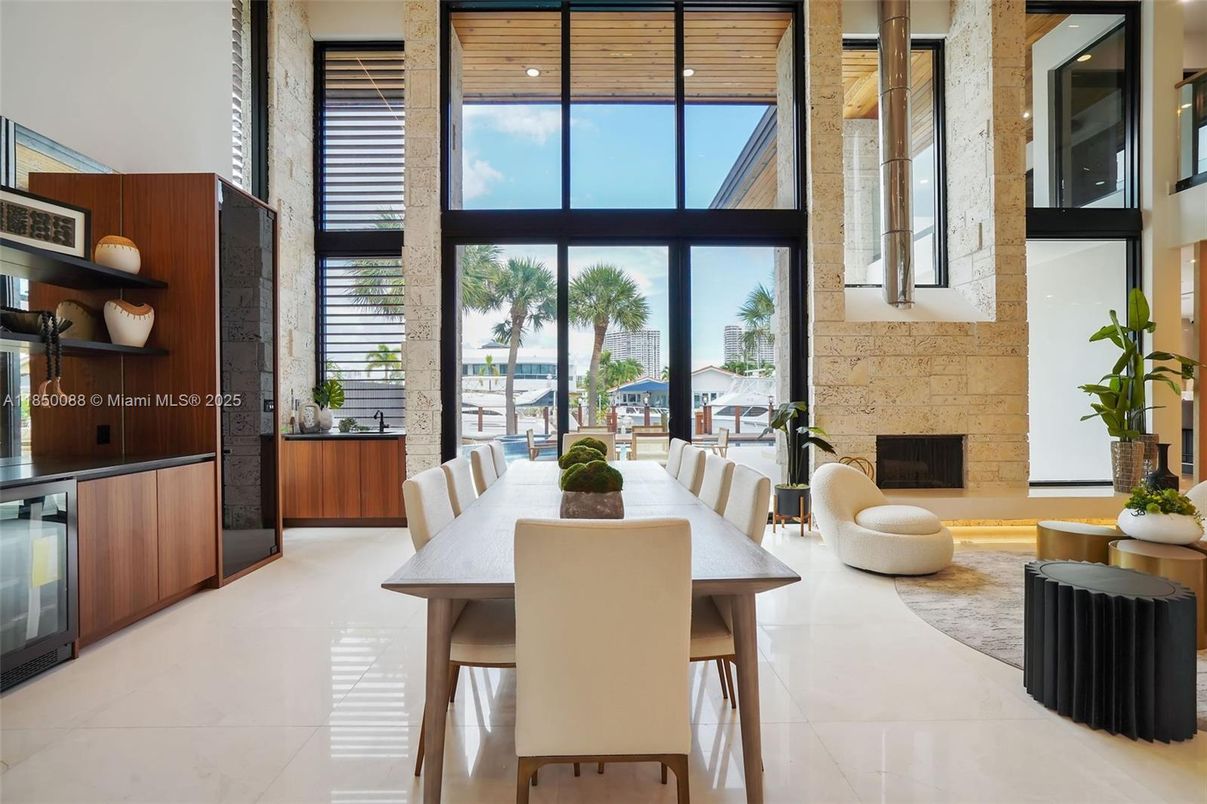 Dining room, Fireplace, Interior, Recessed Lighting, Stone Walls, Water