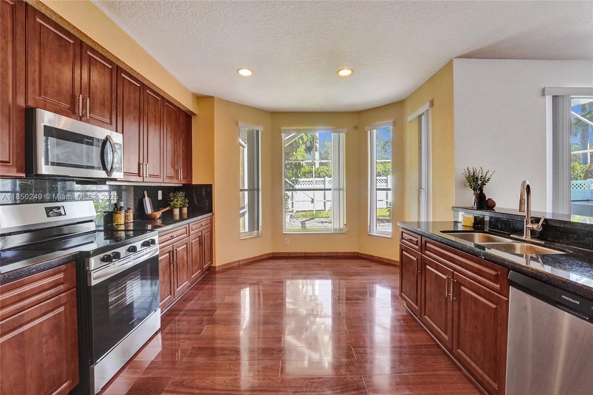 Interior, Kitchen, Recessed Lighting, Stainless Steel Appliances, Wood Texture Flooring