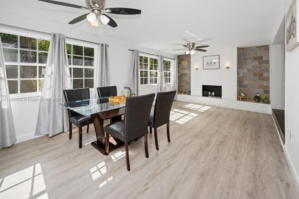 Dining room, Fireplace, Interior, Stone Walls, Wood Texture Flooring