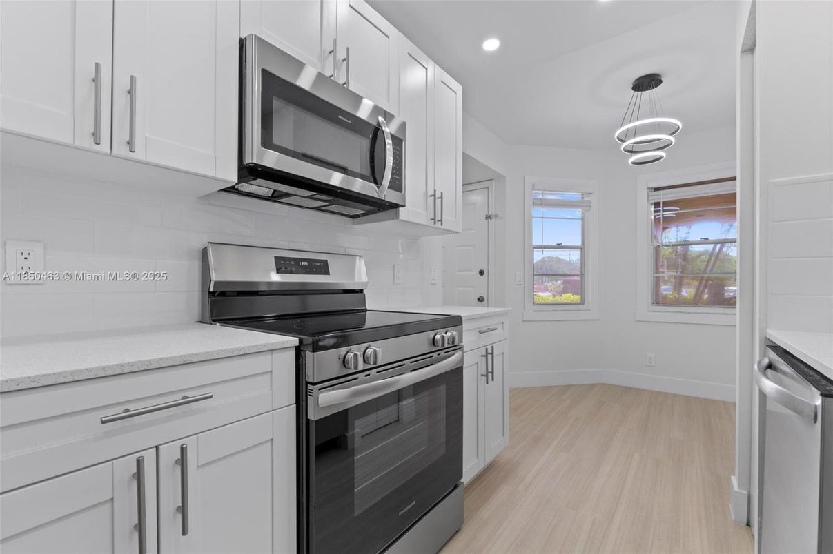 Interior, Kitchen, Pendant Lights, Recessed Lighting, Stainless Steel Appliances, Wood Texture Flooring